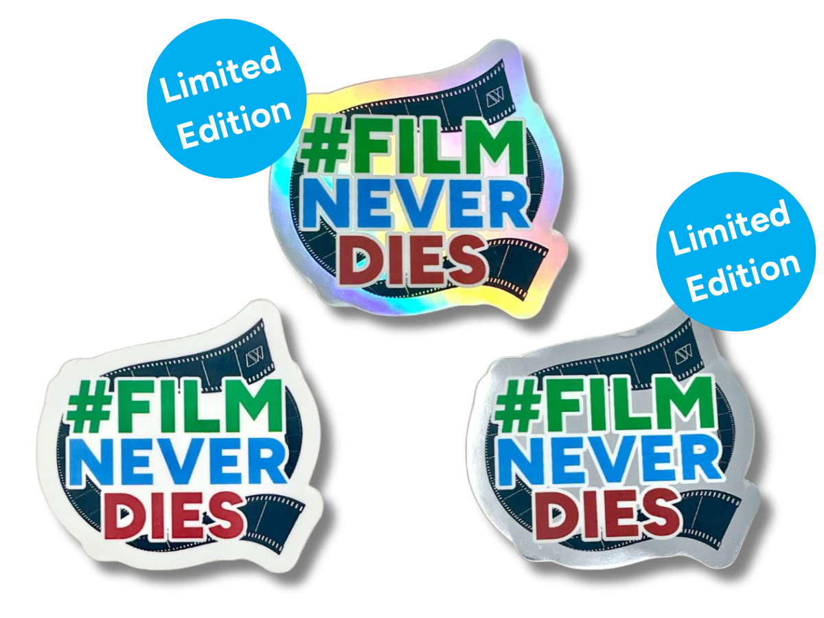 Three Sticker with '#Film Never Dies' text and Analogue Wonderland logo on a Limited Edition Holographic, Limited Edition Mirrored or standard edition White background.