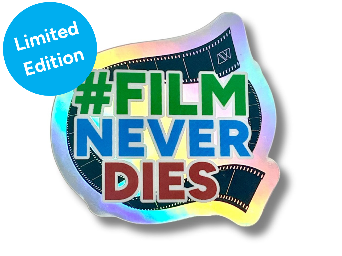 Limited Edition Sticker with '#Film Never Dies' text and Analogue Wonderland logo on a Holographic background.