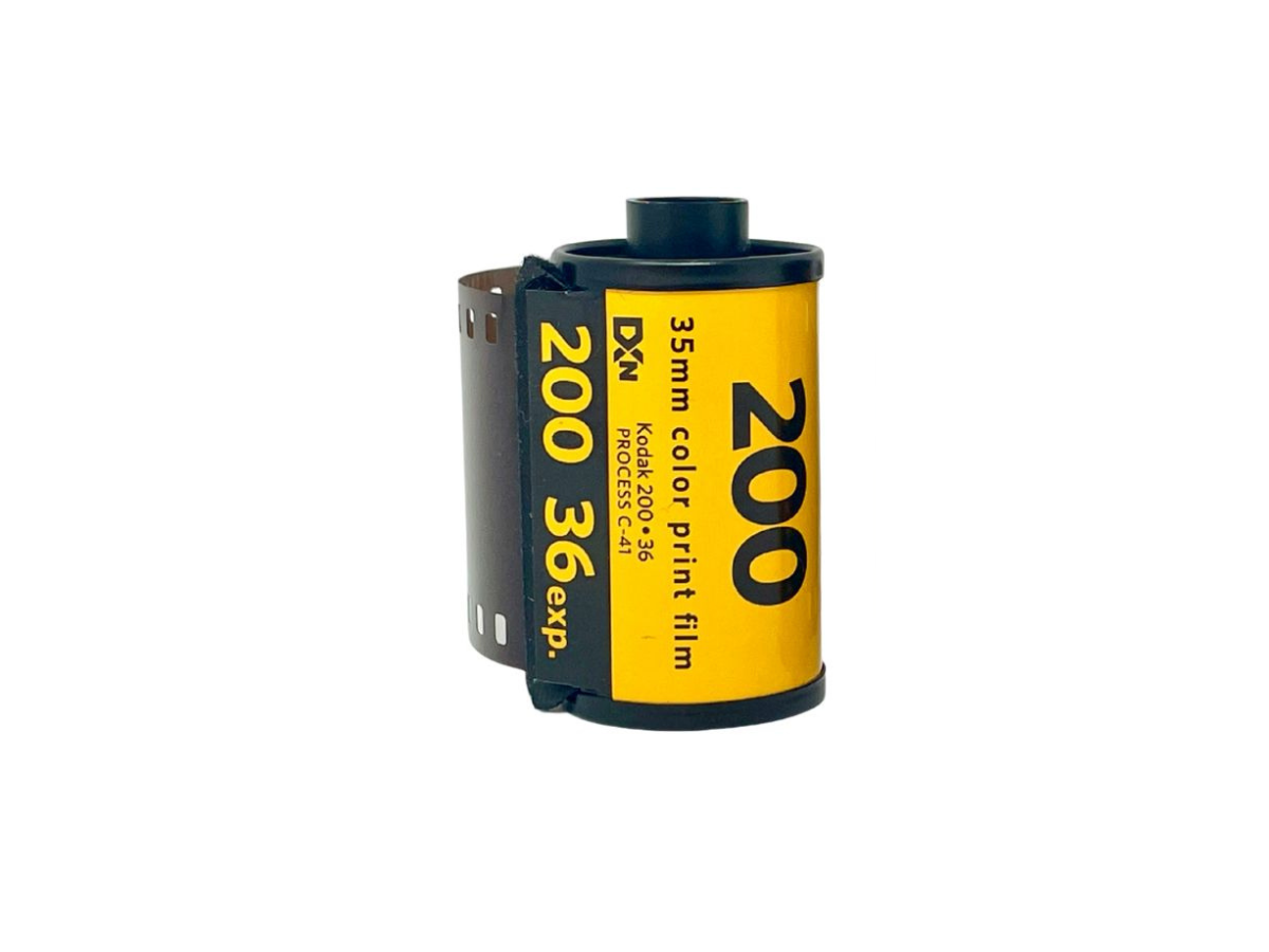 Kodak Gold 200 Film canister with yellow label on a white background