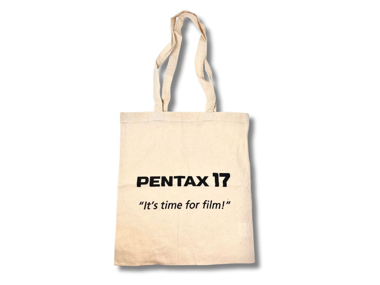 Canvas tote bag with Pentax branding and "It's time for film!" text on a white background.