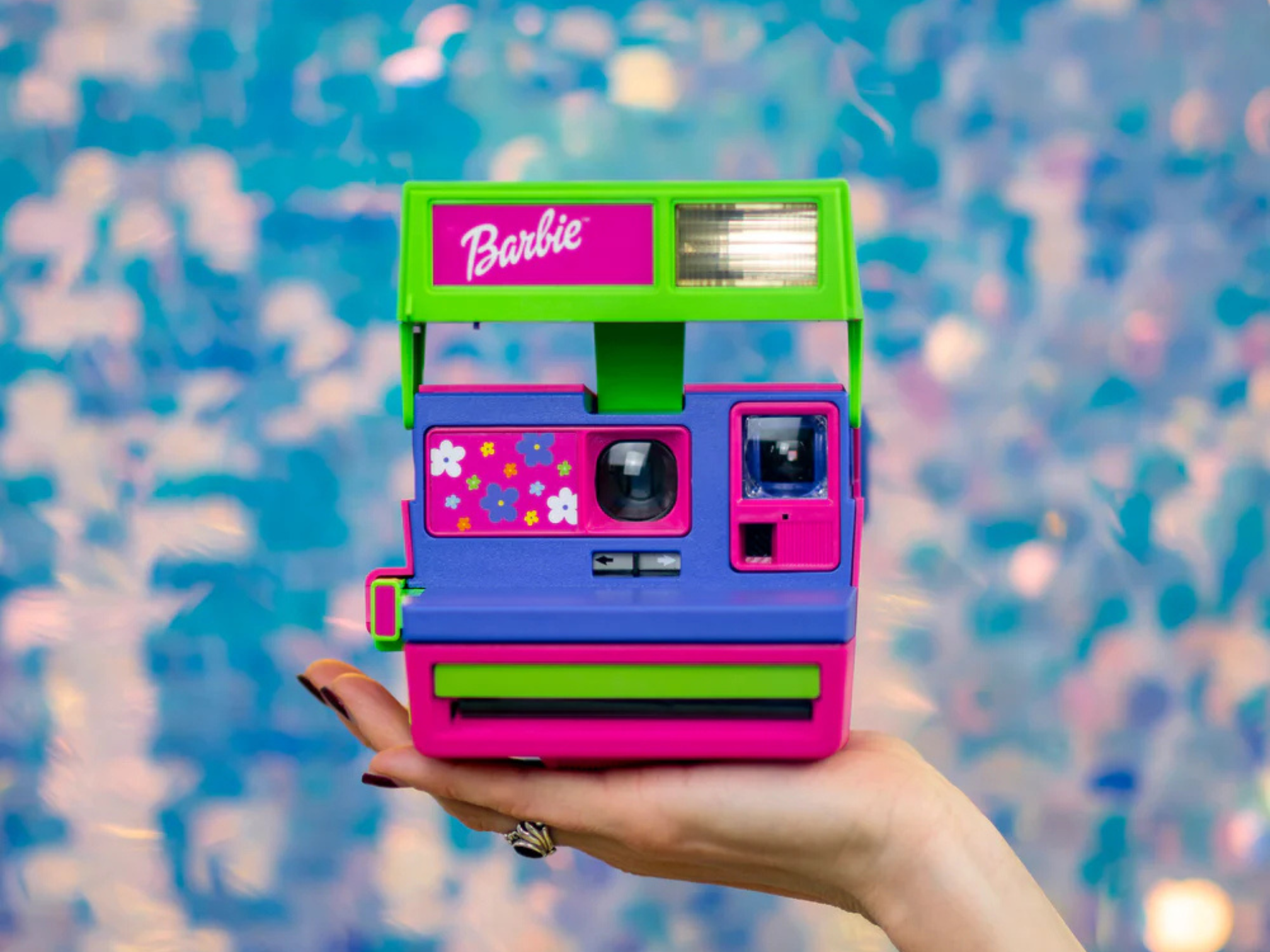Polaroid 600 Barbie Instant Camera - Refurbished Vintage Camera - held by hand