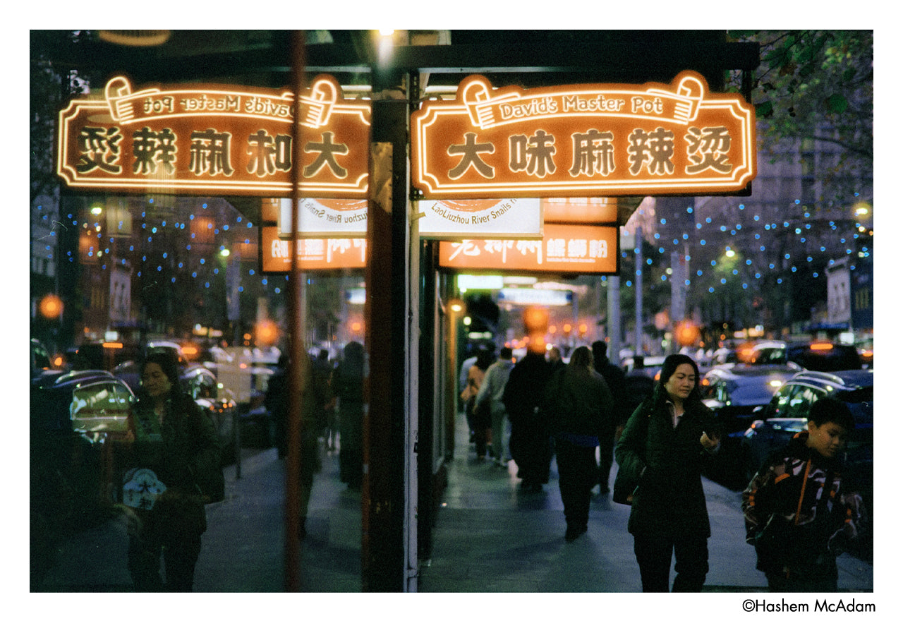 Street scene with Chinese restaurant signs at night - shot on Harman Phoenix II 35mm film