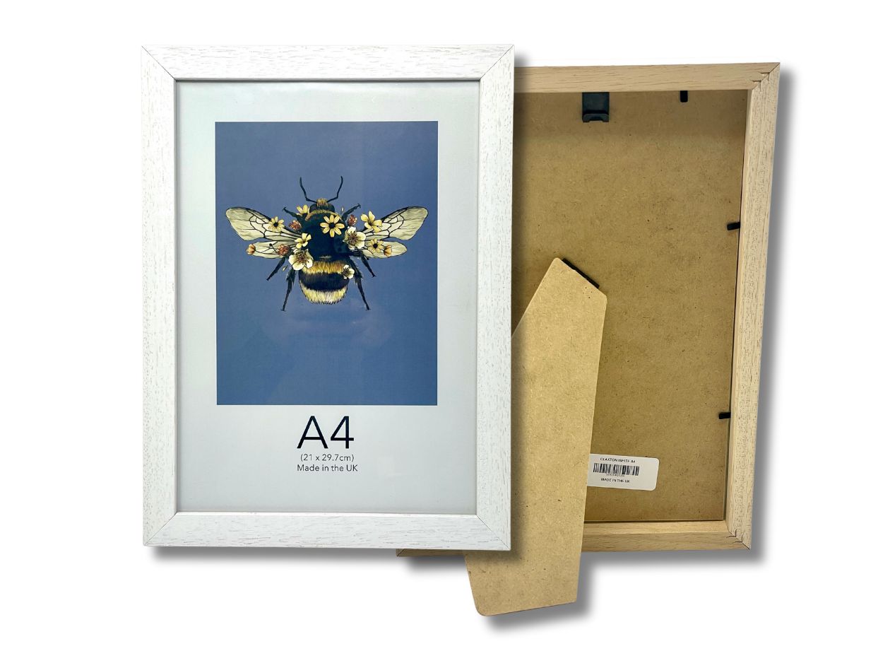 Framed artwork of a bee on a blue background with a cardboard backing, white A4 frame.
