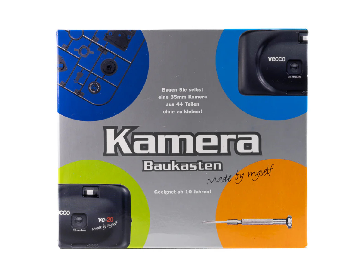 Kamera Baukasten toy construction set packaging with camera images and text on a white background