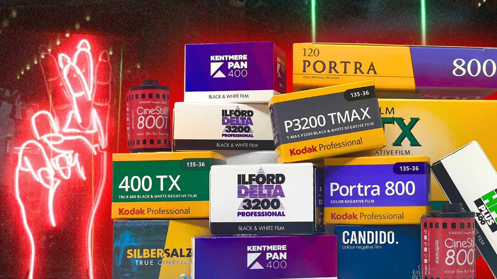Stack of popular colour and black & white films for night and low-light photography, including CineStill 800T, Ilford HP5, Delta 3200, and Kodak Portra 800.