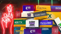 Stack of popular colour and black & white films for night and low-light photography, including CineStill 800T, Ilford HP5, Delta 3200, and Kodak Portra 800.