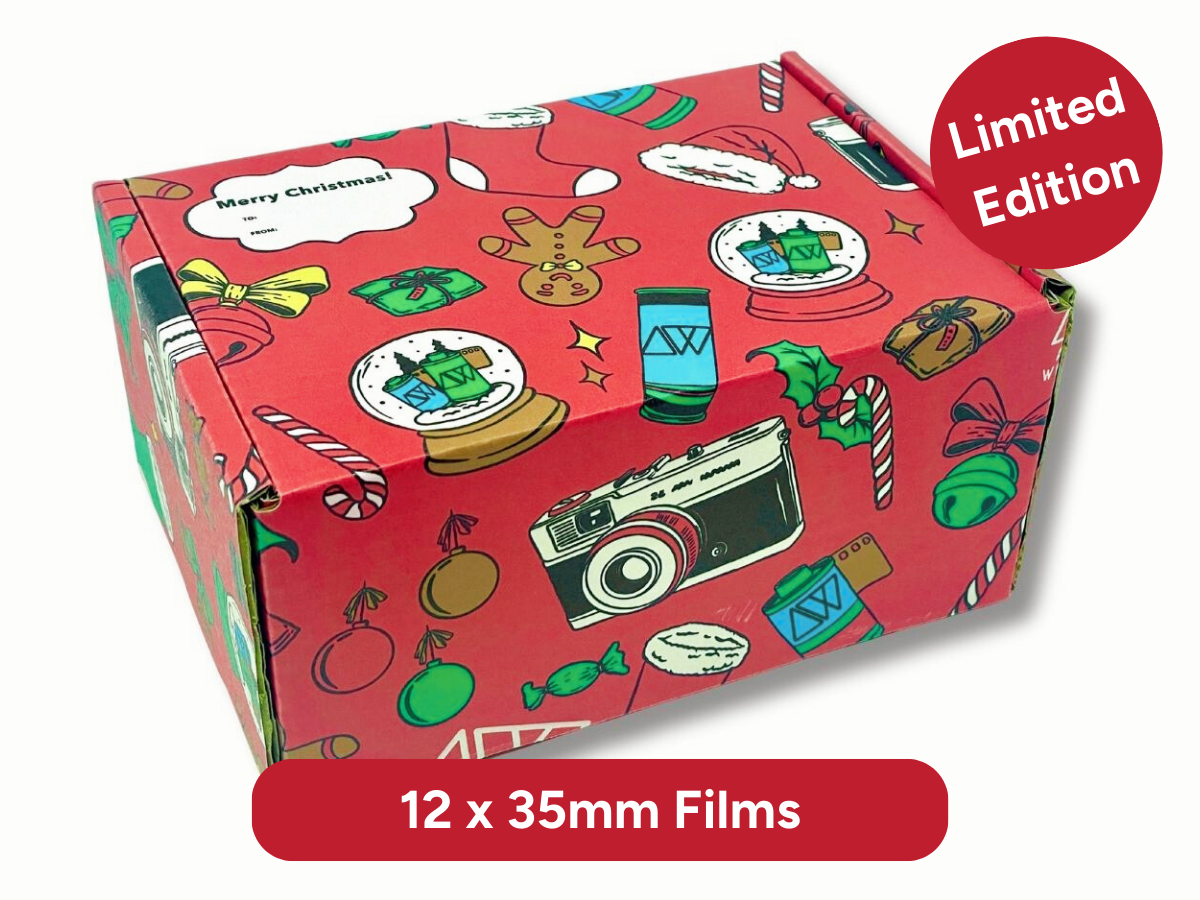 Red box with Christmas-themed design and 'Limited Edition' label on a white background