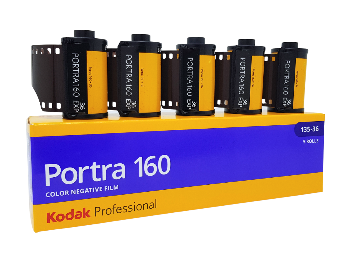 A box of Kodak Portra 160 Professional color negative film with five film rolls displayed on top. The packaging features a bold blue and yellow design, and the film rolls are black with yellow labels.
