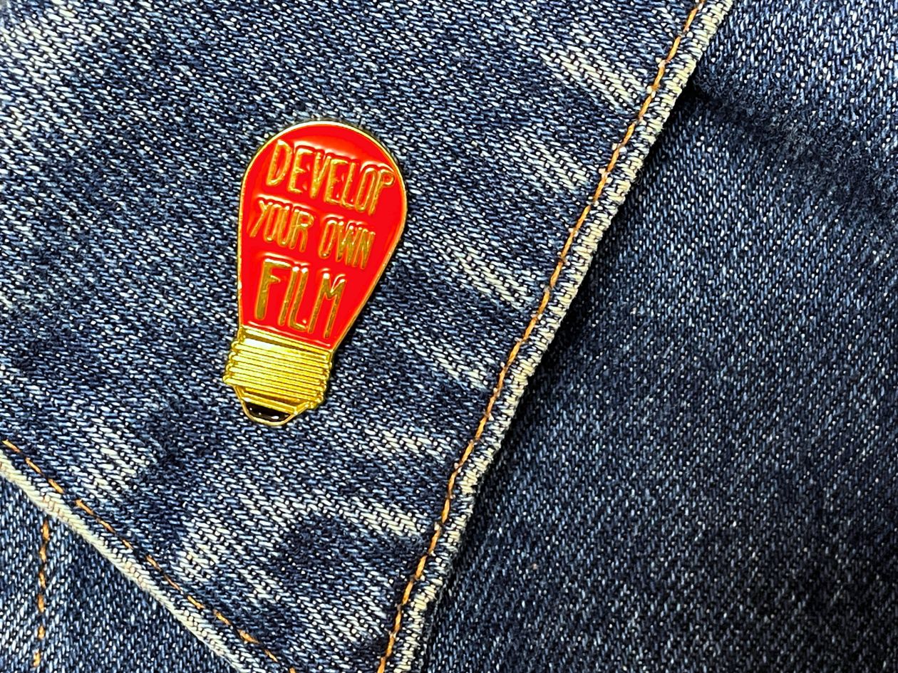 Official Exclusive - Develop Your Own Film Darkroom Red Bulb - Enamel Pin