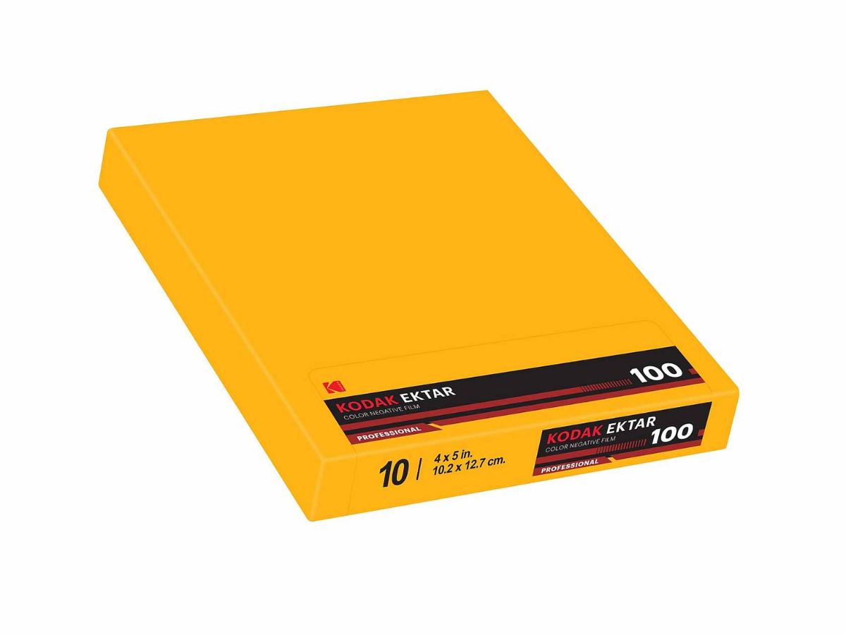 A pack of Kodak Ektar 100 professional sheet film in a bright yellow cardboard case, shown at an angle on a white background.
