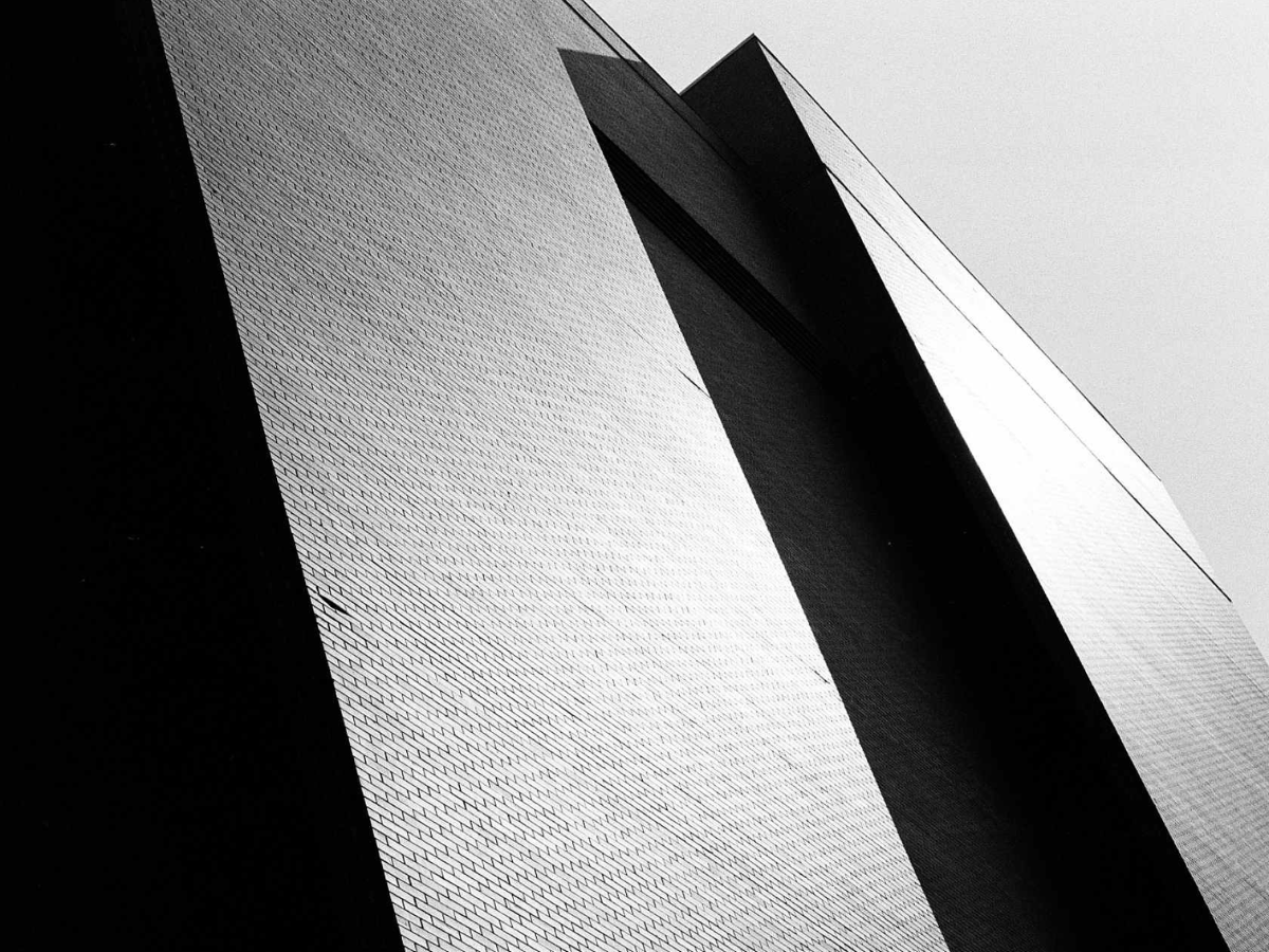 High angle shot of building with dark contrasting shadows