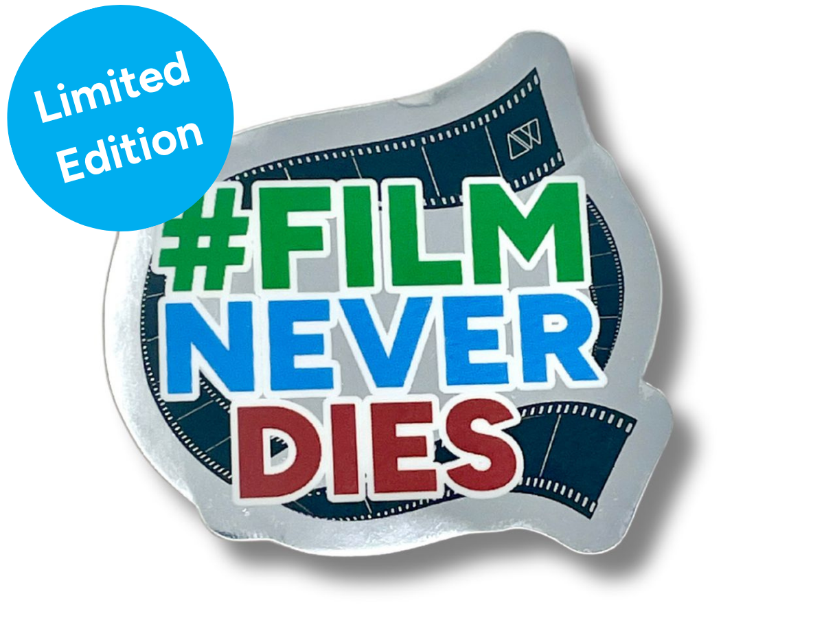 Limited Edition Sticker with '#Film Never Dies' text and Analogue Wonderland logo on a mirrored background.