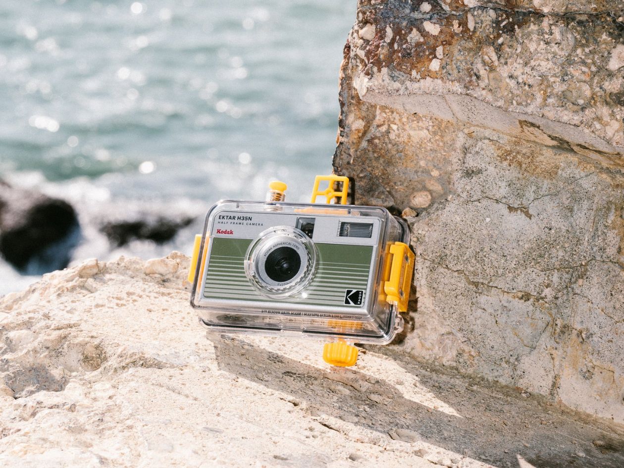 Kodak Ektar H35N & H35 Waterproof Case - Lifestyle H35N Camera in Case on Rock