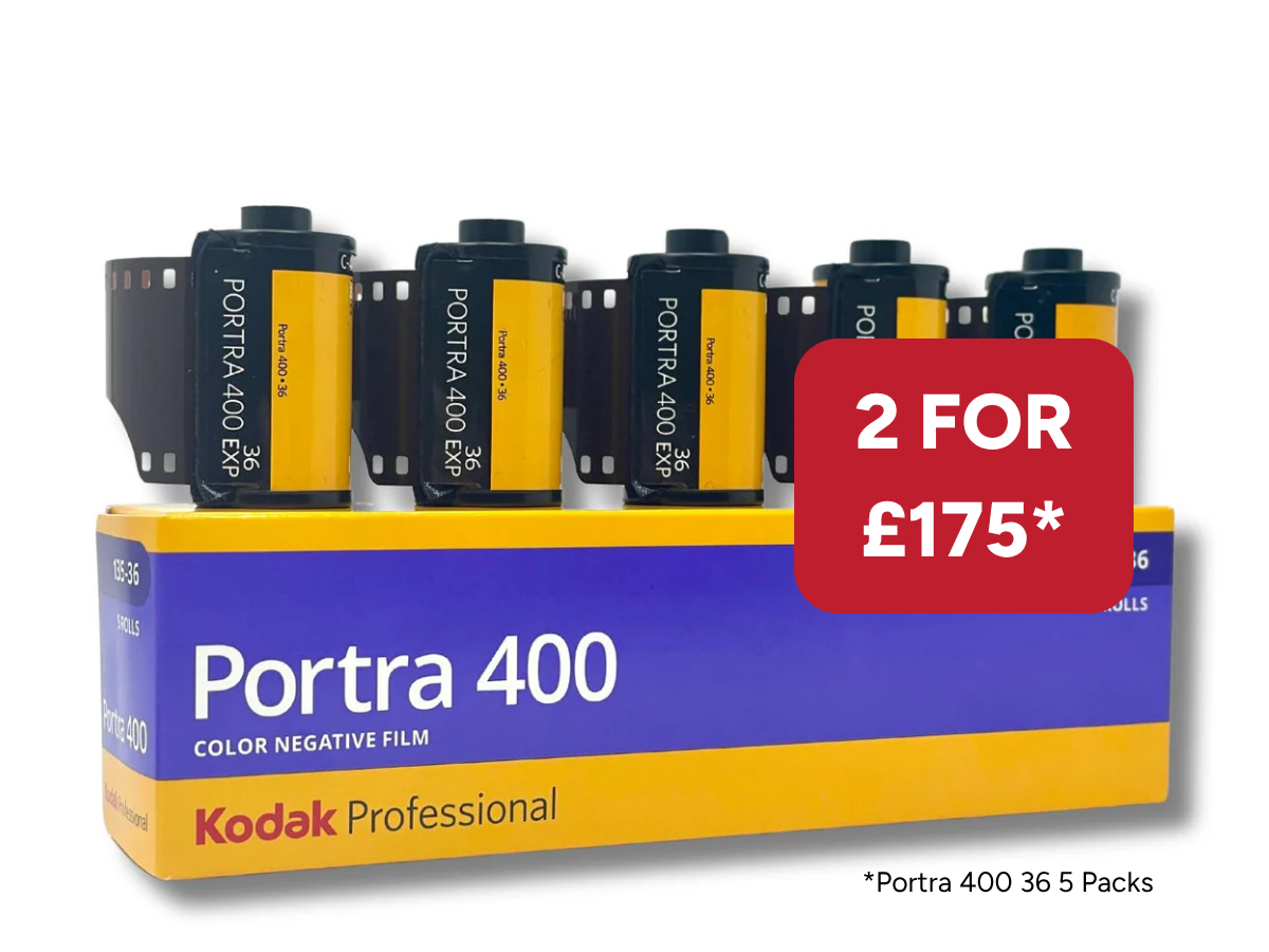 Kodak Portra 400 film packaging with multiple film cans and a promotional offer on a white background.