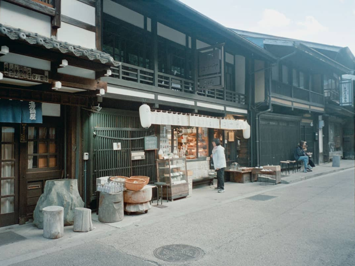Traditional Japanese street scene with shops and people. (c) Sample Photos by @notmegapixels
