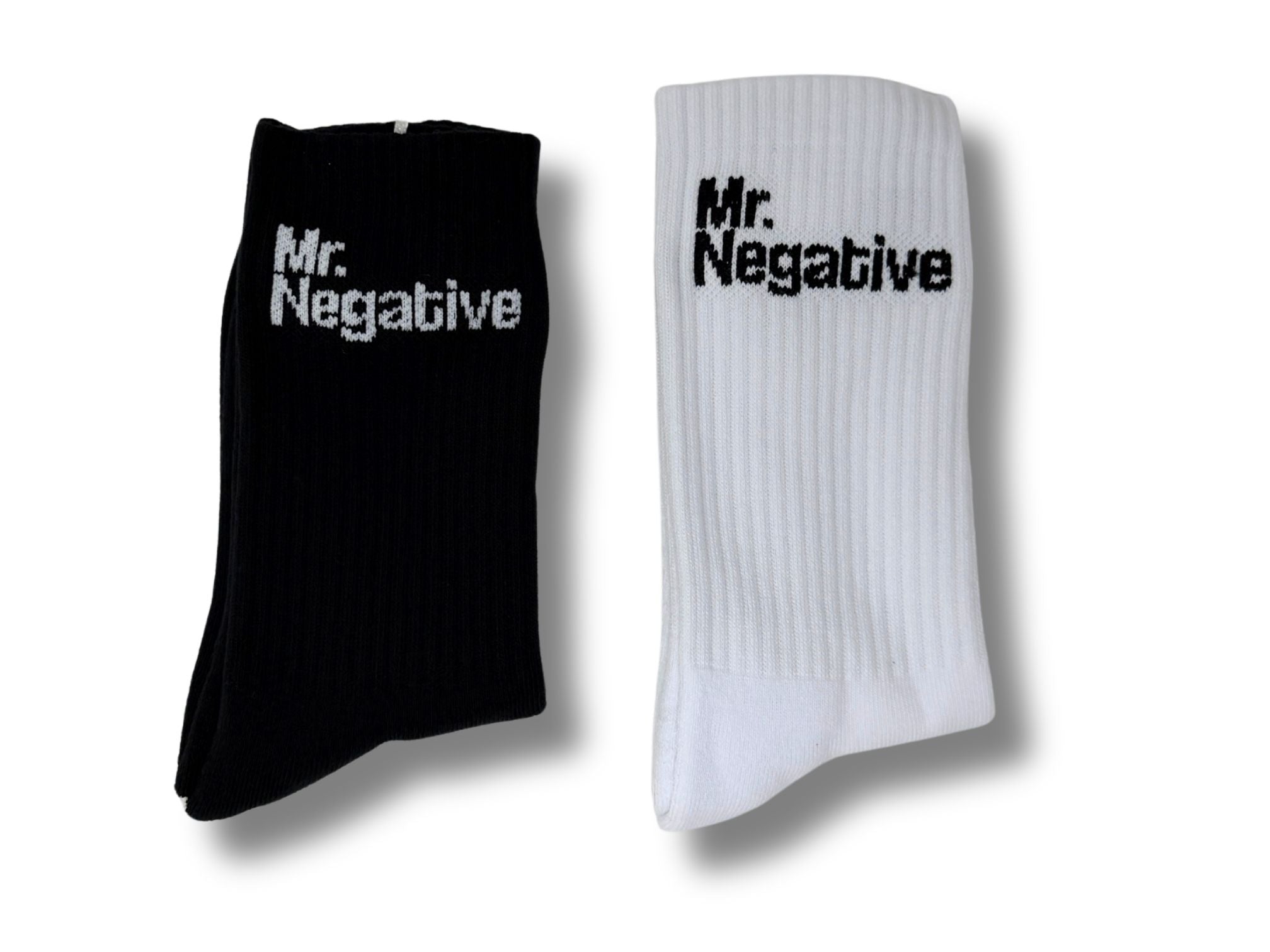 Black and white socks with 'Mr. Negative' text on a white background