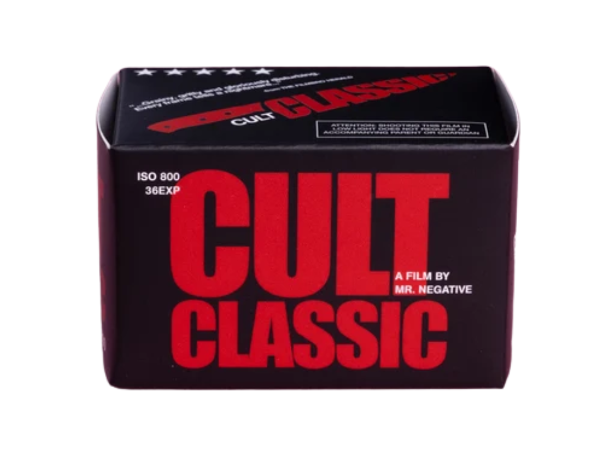 A box of Cult Classic film negatives, featuring a black background with bold red and white text, photographed against a plain white background.