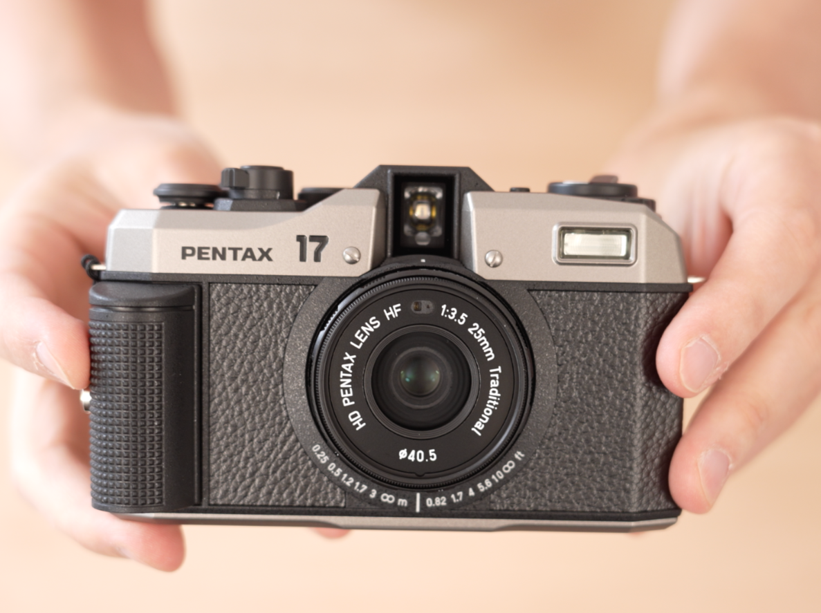 Pentax 17 Film Camera - Product Photo - the full camera being held