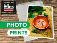 Photo print of a bowl with flowers on a wooden surface, with '2025 Awards' and 'Best Processing Lab' text.