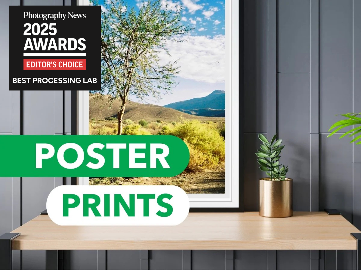 Poster print of a landscape with 'Photography News 2025 Awards' text overlay on a wall.