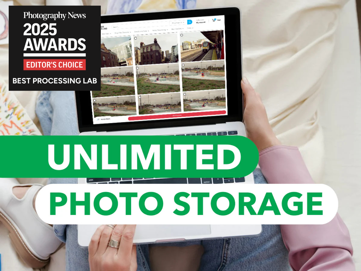 Person holding a laptop with photo editing software, surrounded by text about Photography News 2025 Awards and unlimited photo storage.