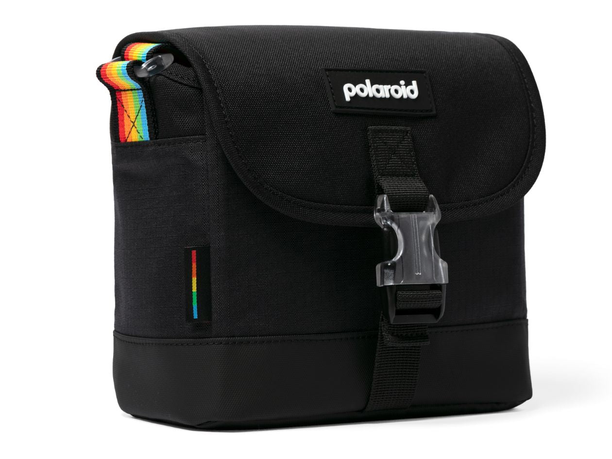 Black Polaroid bag with colourful accents on a white background.