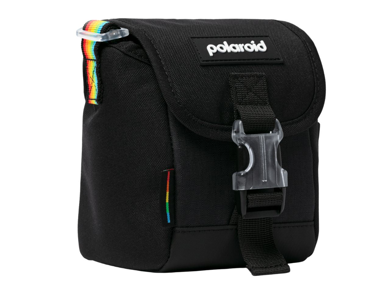 Black shoulder bag with rainbow accents and Polaroid logo on a white background.