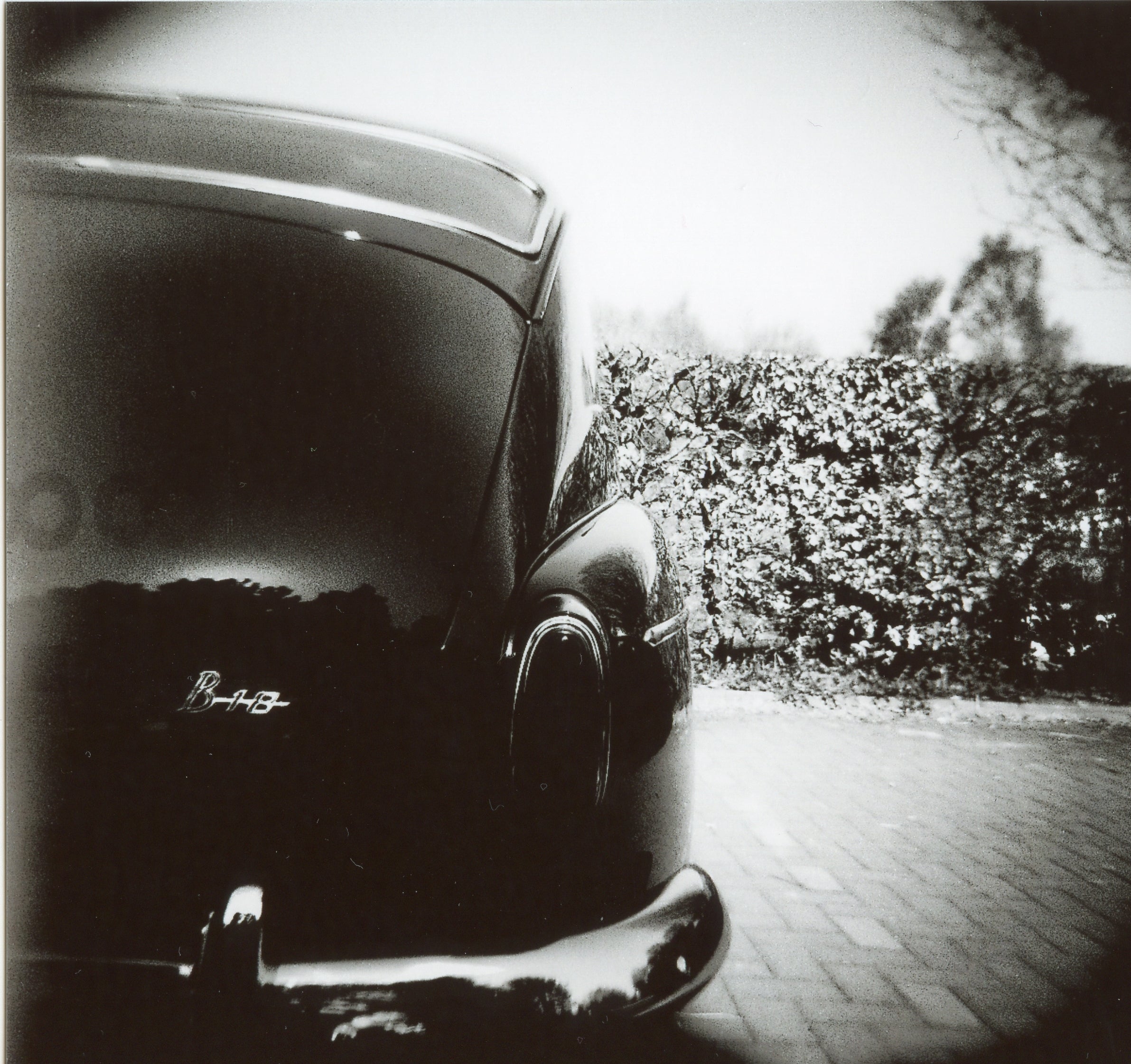 Photo of car on adox chs II 120 b&w film